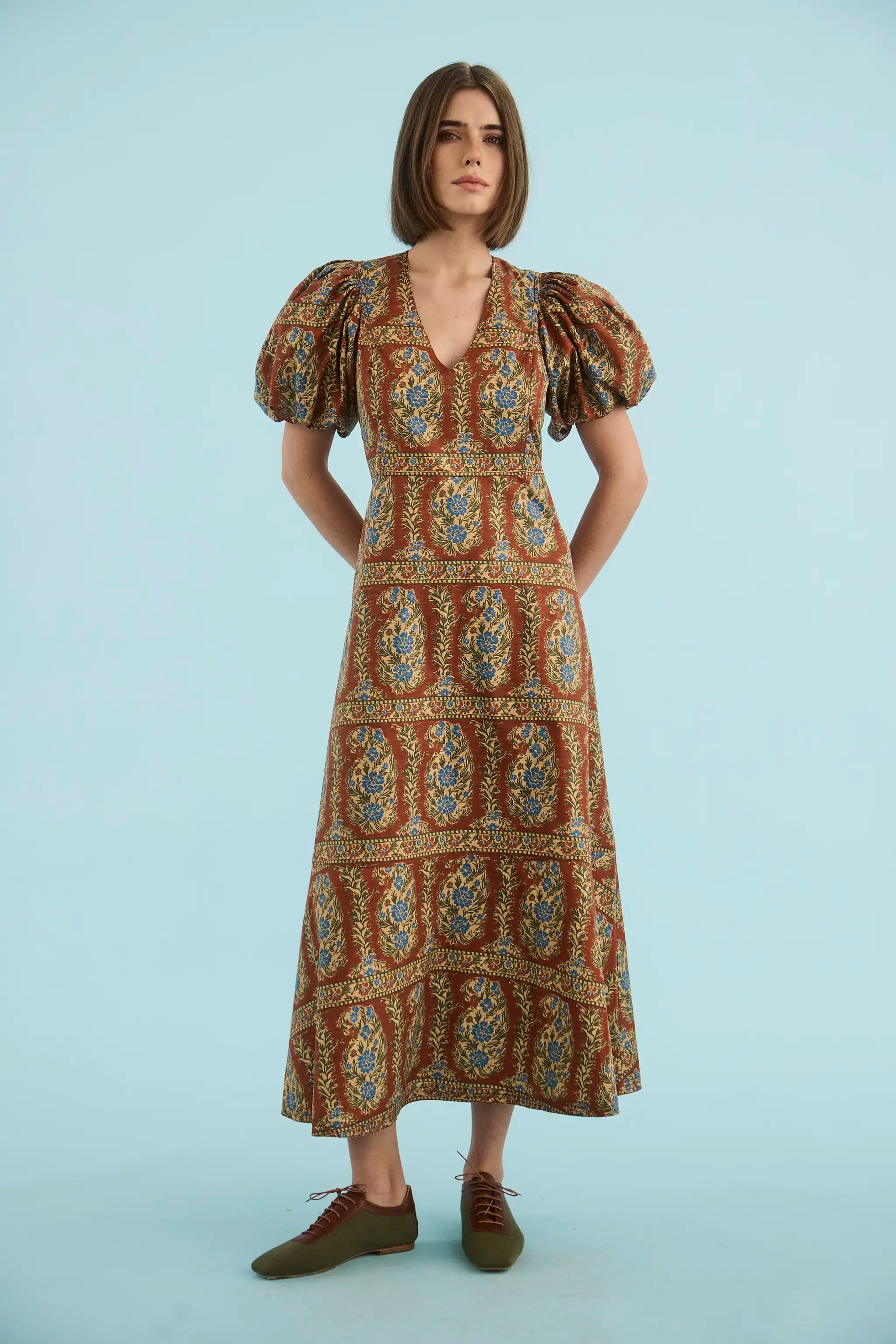 The Harrison Dress in Amber Glen Brown. 