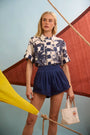 The Faye Short in Deep Sea paired with Hawkins Top in Bermuda Toile. 