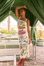 A midi pencil skirt in our anniversary print, with a clean back vent and zipper closure