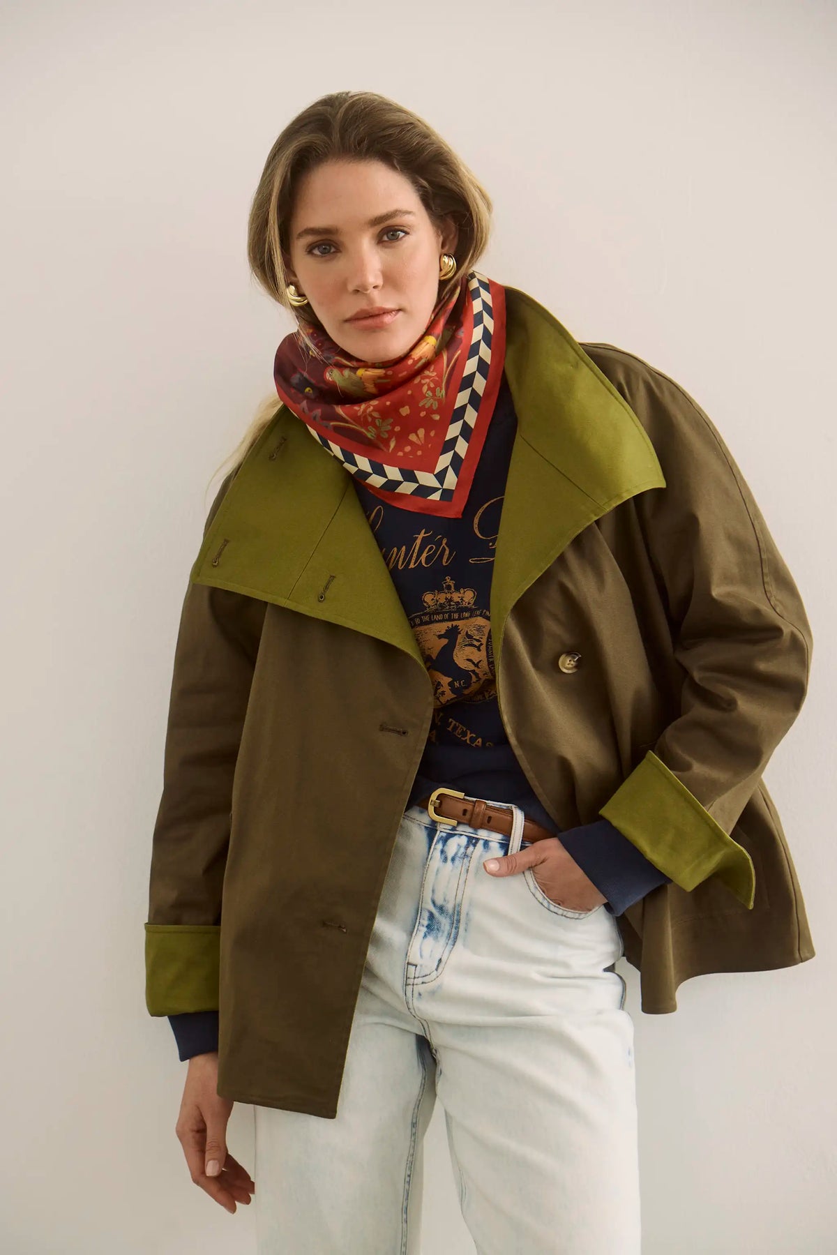The scarf in Birds of a Feather Maroon paired with the Howell Cropped Trench and Wray Pant. 