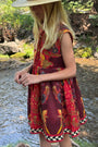 Harrison in the Piper Dress in Birds of a Feather Maroon.
