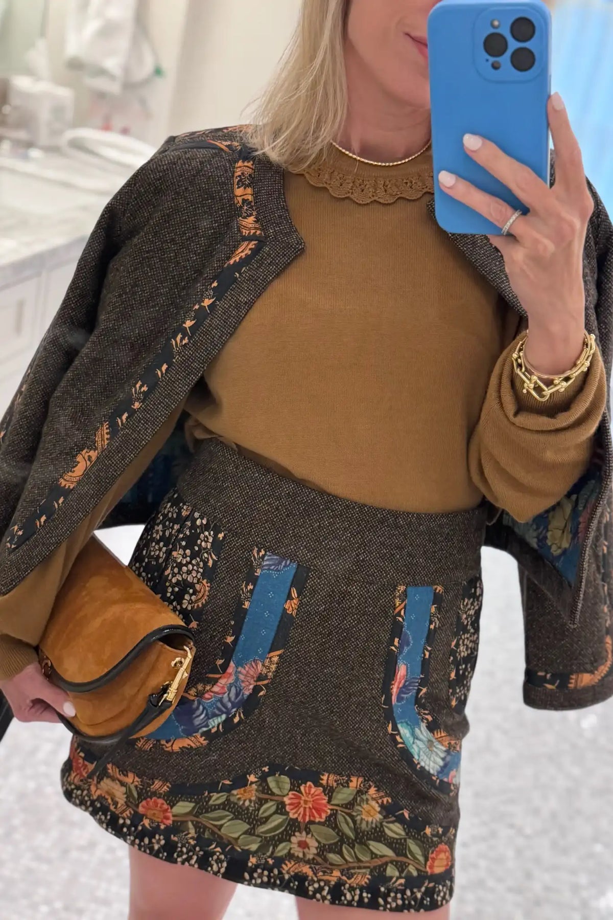 Hunter in the Watts Jacket, Opal Sweater and Schulte Skirt.