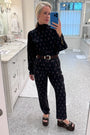 Hunter in the Ellerie Top and Whitton Pant in Paisley Posey.