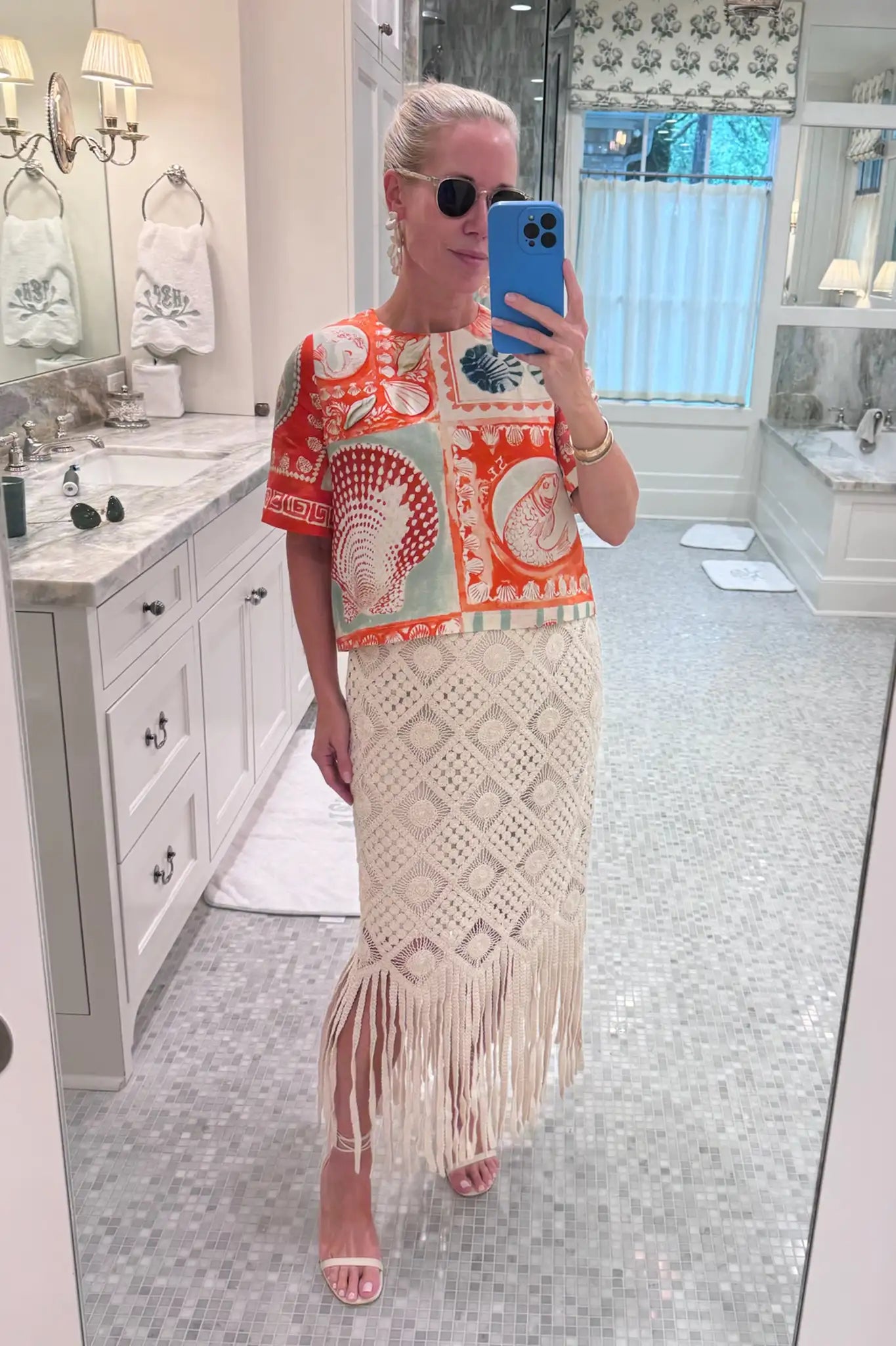 Hunter wearing the Maeve Top and the Rivington Skirt.