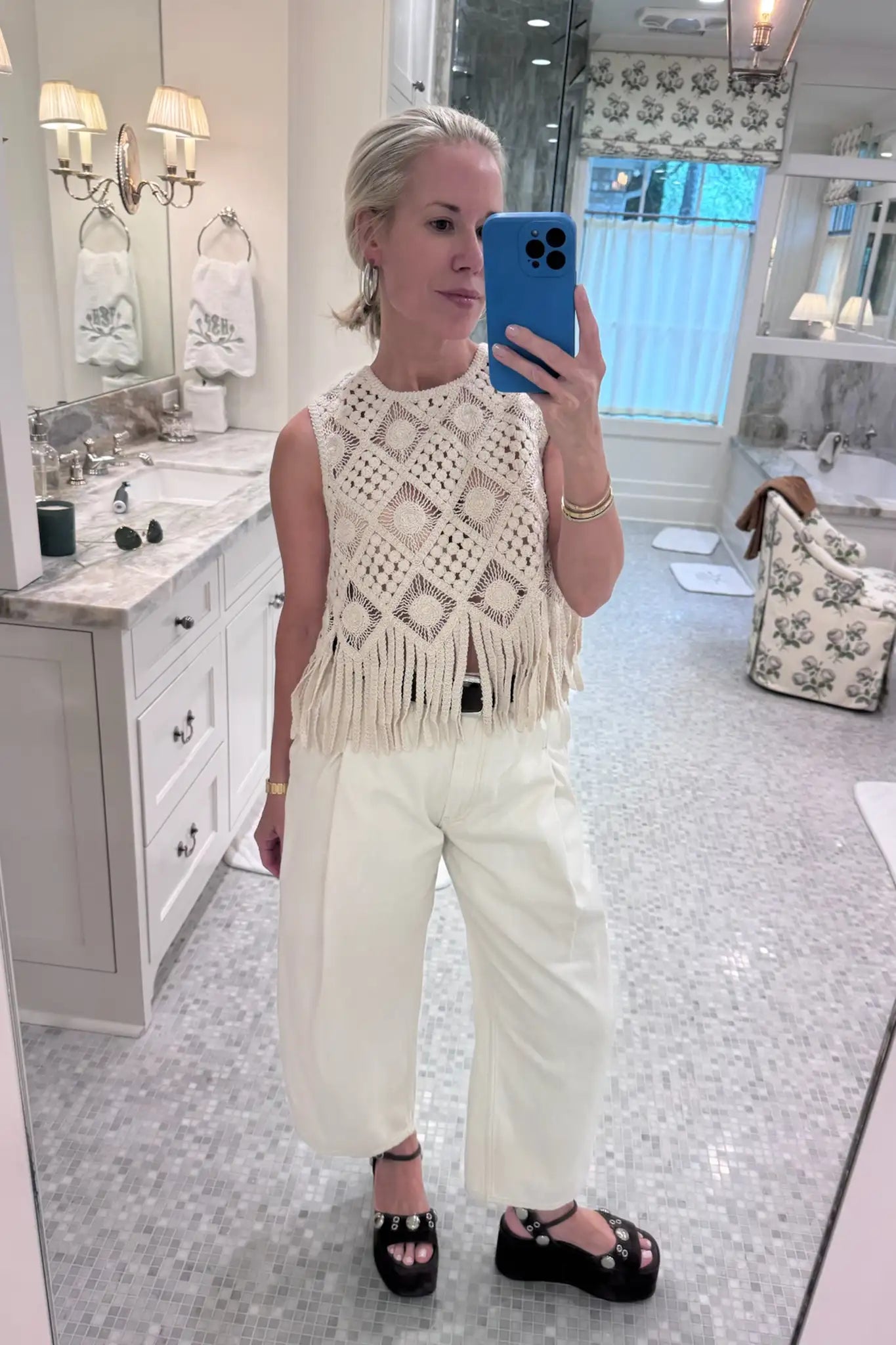 Hunter wearing the Astor Top in cream.