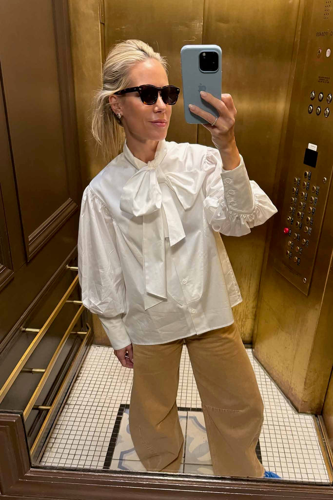 Hunter wearing the Shay Blouse in New York.