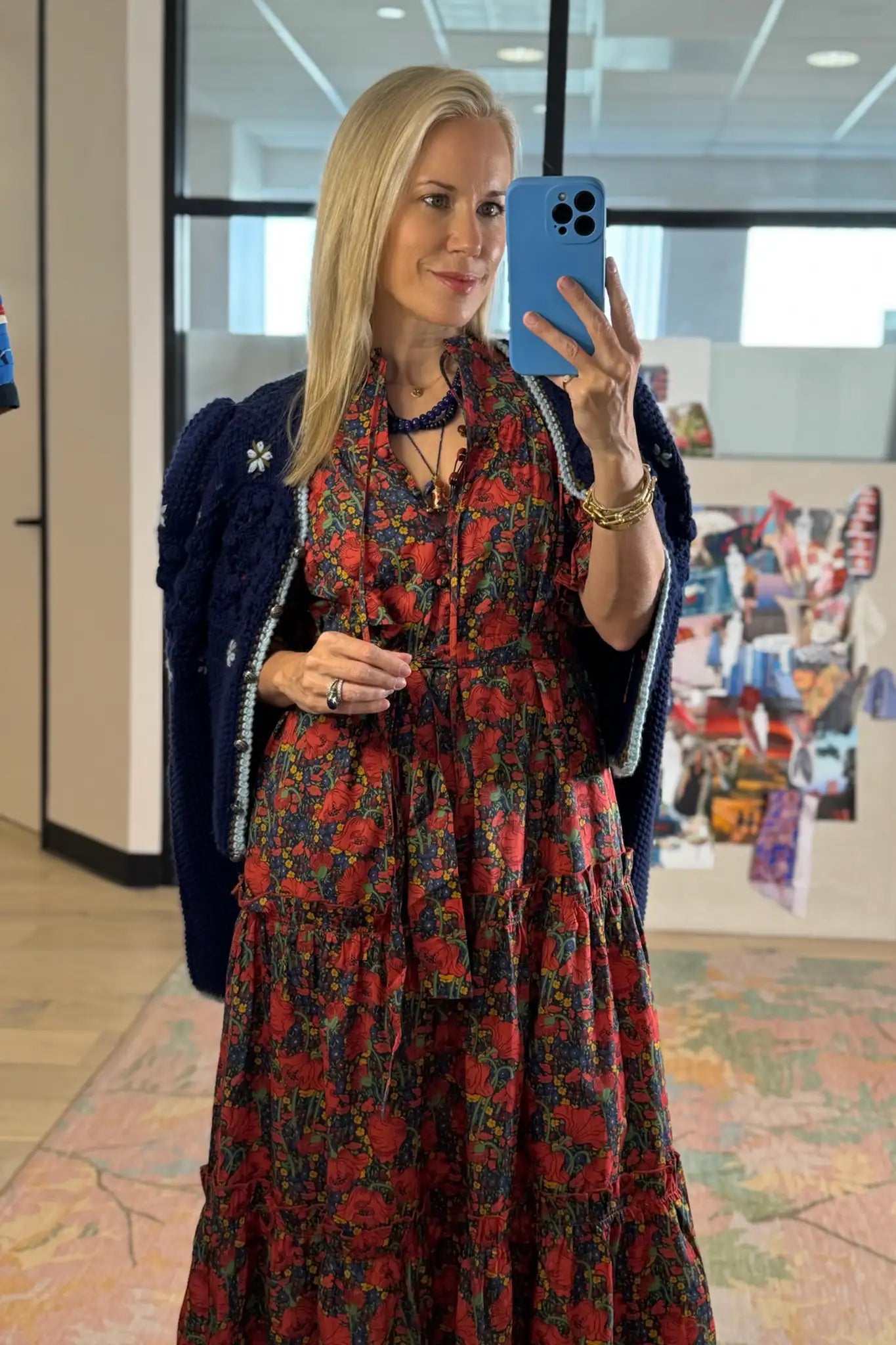 The Holloway Dress has v-neck, elbow-length puff sleeves, tiered ruffled seams and an optional sash.