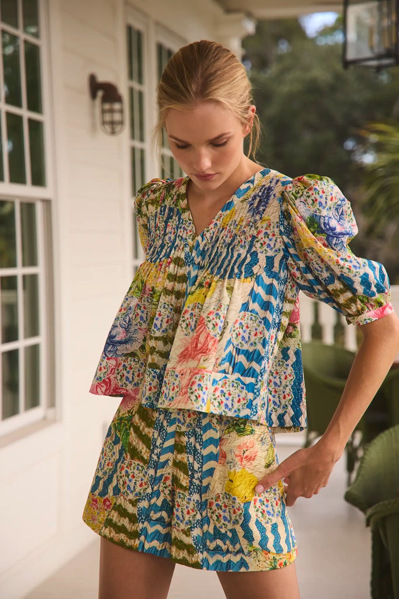 Ashton Shorts in Morning Glory print paired with matching Irene Top on model 