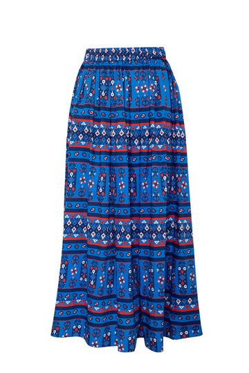 The Tatum block print midi skirt has a covered elastic waistband, a relaxed fit.