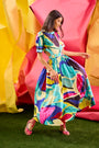 Midi dress in colorful print including pink, green, pink and black with side bodice cut-outs