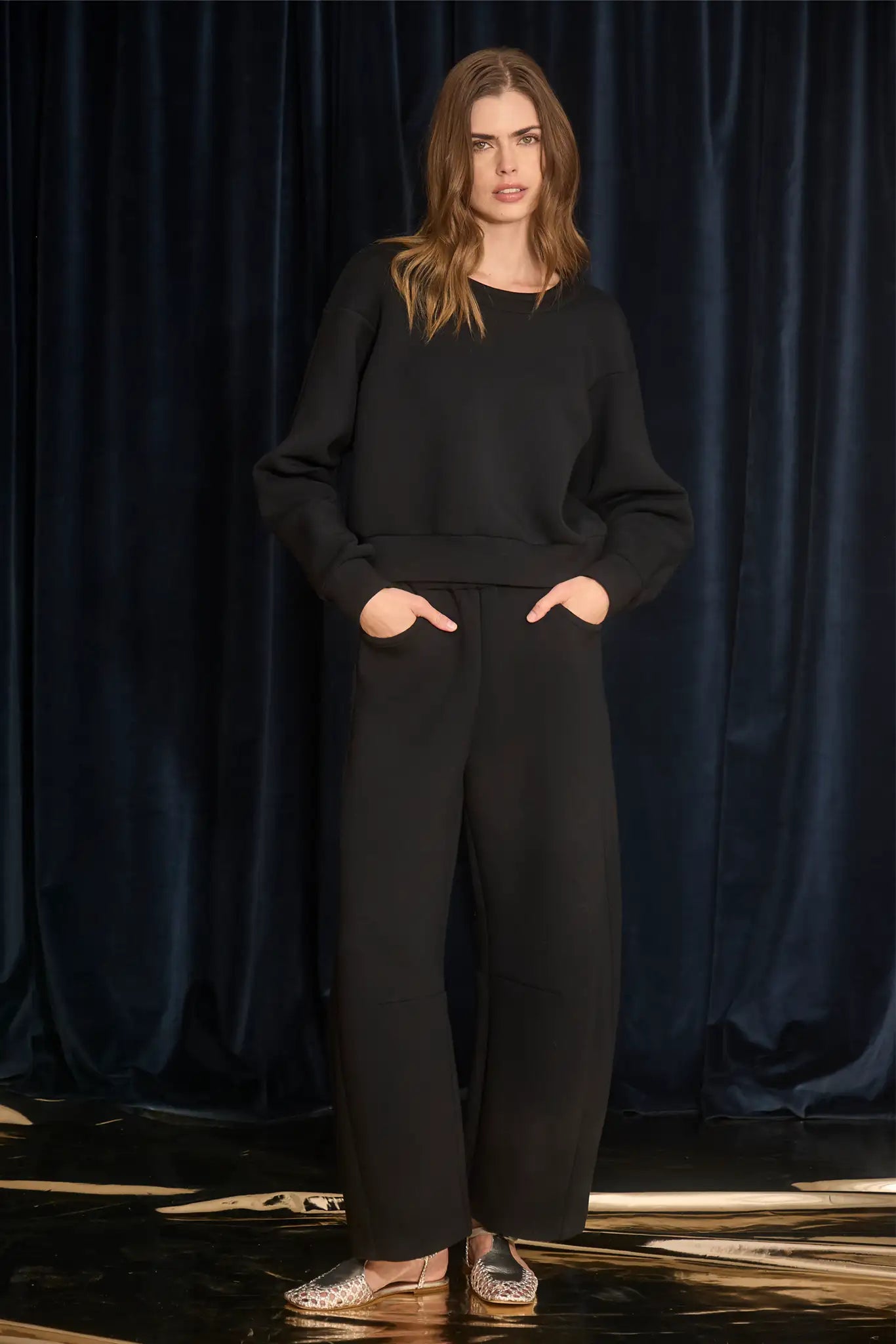 Duvall Pant is a five-pocket jean and holds a barrel-leg shape with a front fly, zipper and button.