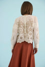The Jennifer Top in Ivory paired with the Joan Skirt in Rust. 