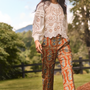 The Jennifer Top in ivory paired with the Juno Pant in Amber Glen Brown. 