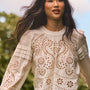 The Jennifer Top in ivory paired with the Juno Pant in Amber Glen Brown. 
