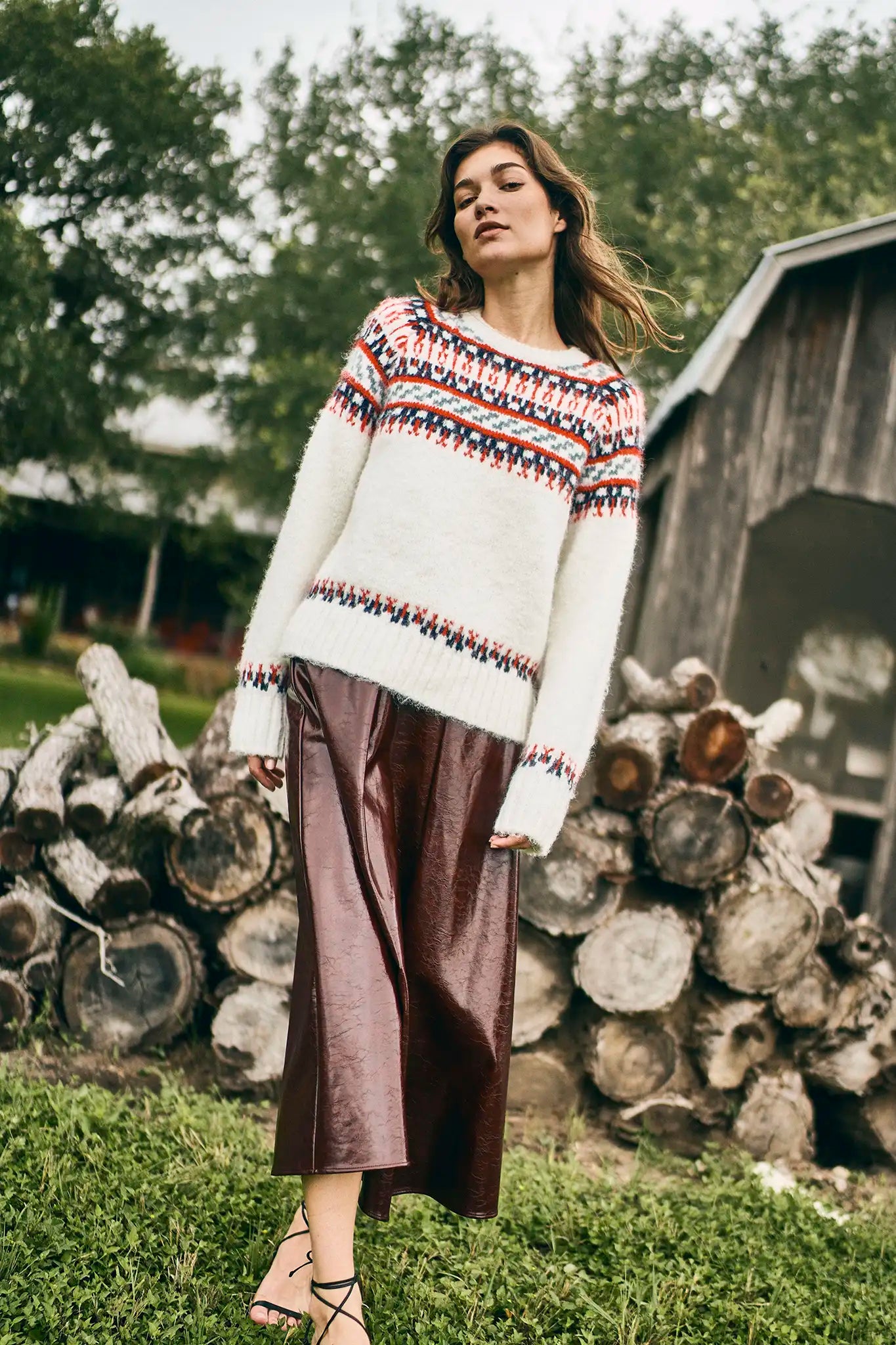 The Josie Sweater in Cream Fairisle has a ribbed crew neckline and long raglan sleeves.