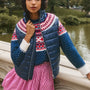 The Brady Vest is a elevated puffer with a collared neckline and a knitted Fair Isle yoke.