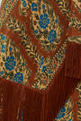 Close up of the scarf in Amber Glen Brown. 