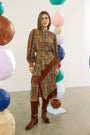 The Allyne Skirt in Amber Glen Brown paired with the matching Karis Blouse. 
