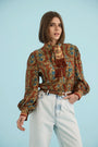 The Karis Blouse in Amber Glen Brown paired with Wray Pant in washed blue denim. 