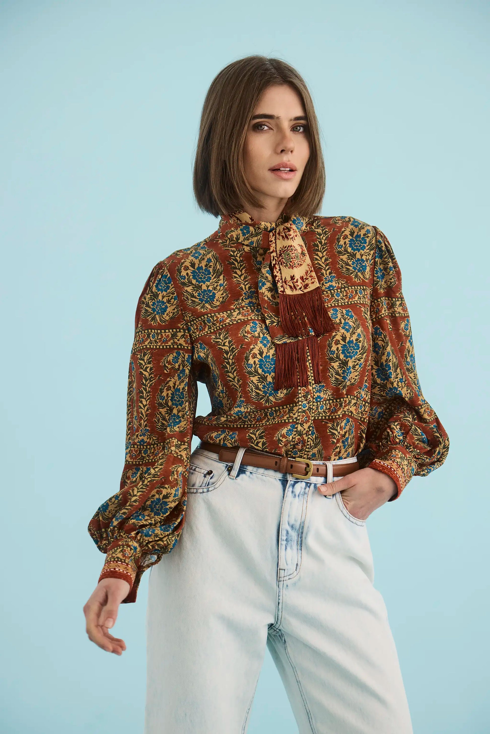 The Karis Blouse in Amber Glen Brown paired with Wray Pant in washed blue denim. 