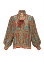 The Karis Blouse in Amber Glen Brown. 