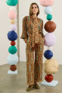 The Juno Pant in Amber Glen Brown paired with matching Karis Blouse. 