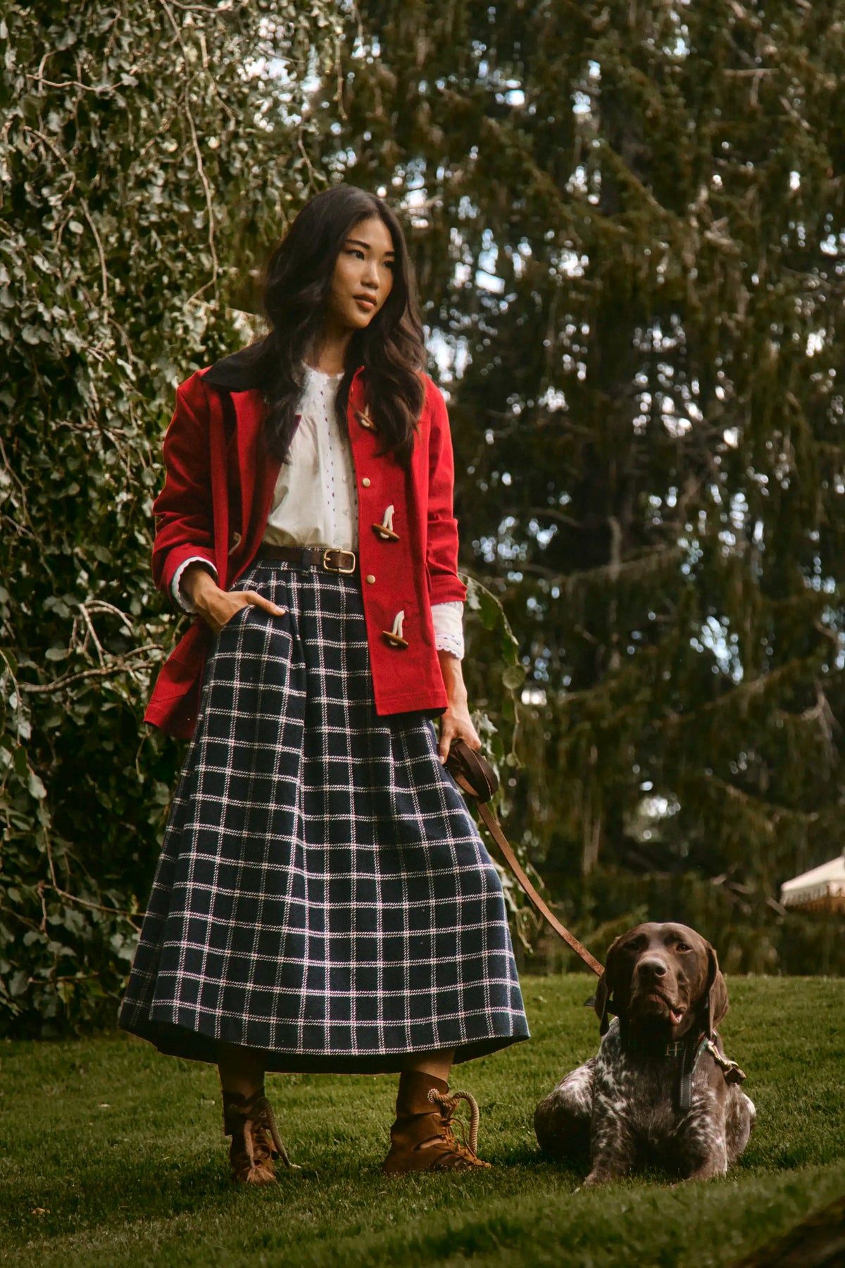 The Keegan Toggle Jacket in Fireside paired with the Finch Top in Ivory and the Queenby Skirt.