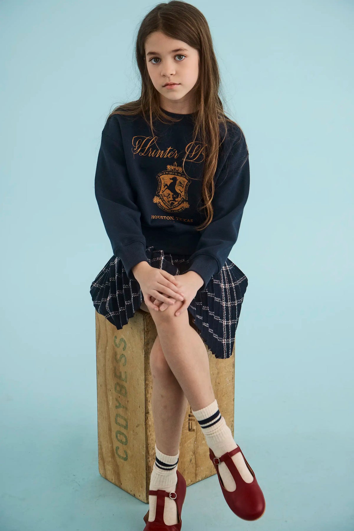 The Kids Pattie Skirt in St. Andrews Check paired with our Kids Heritage Sweatshirt. 