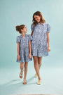 The Drifter Mini Dress in Bermuda Blooms with matching kids Merritt Dress. 