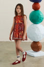 The Kids Piper Dress in Birds of a Feather Maroon. 