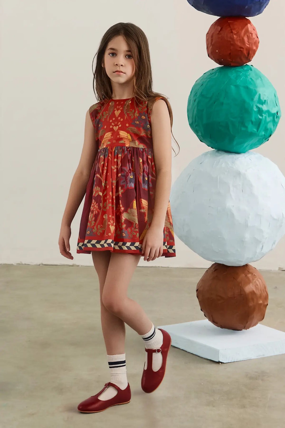 The Kids Piper Dress in Birds of a Feather Maroon. 