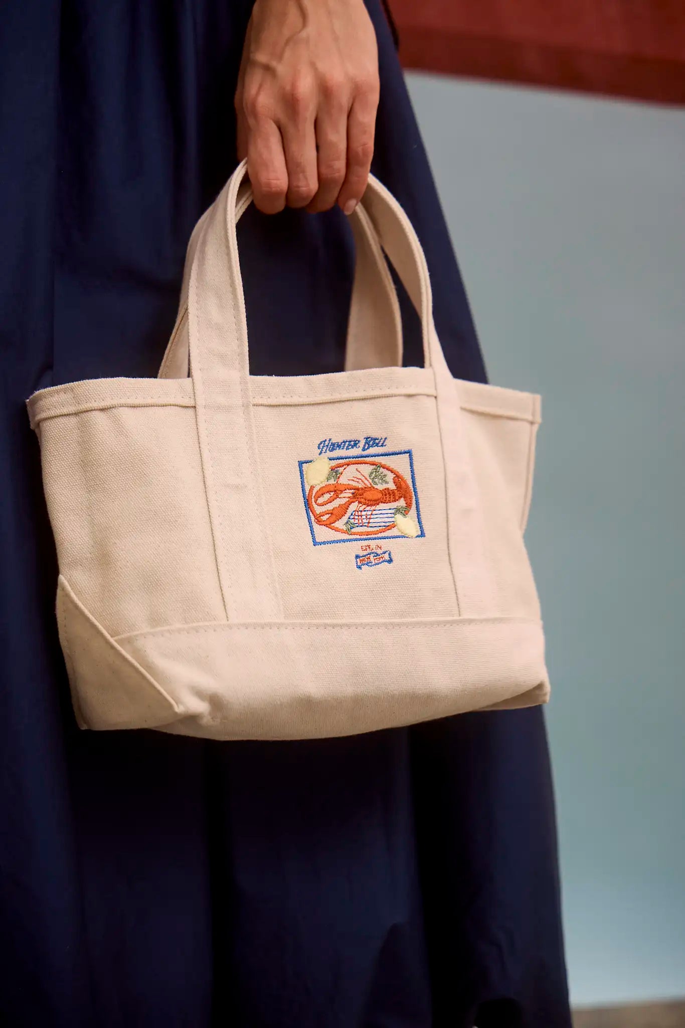 Small canvas tote with a lobster design.