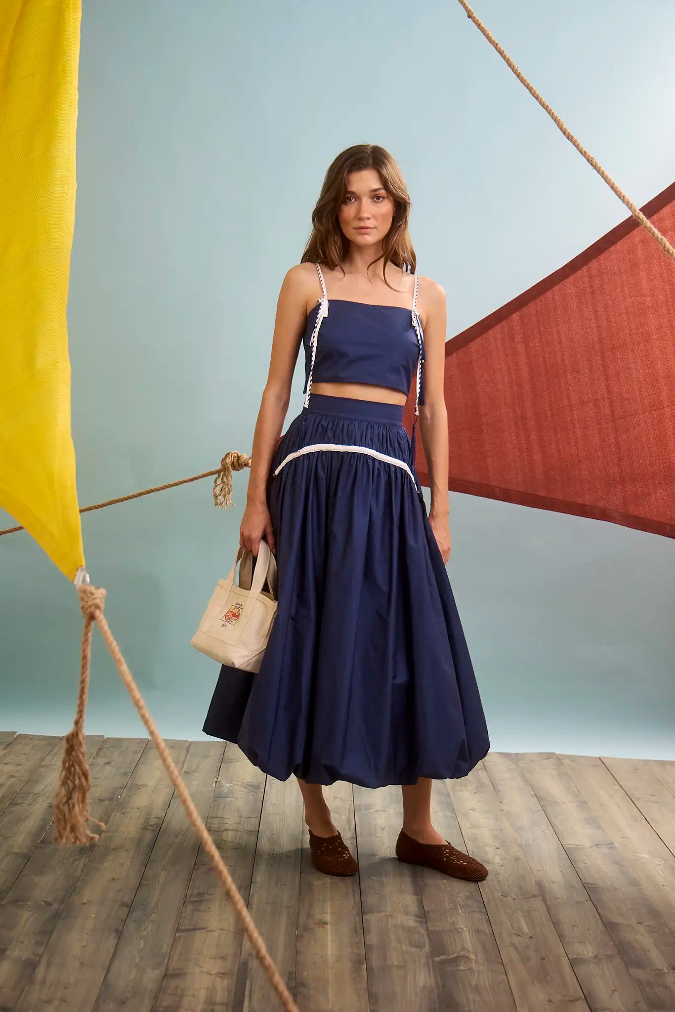 The Allegra Skirt in Navy paired with Kiki Top in Navy.