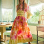 A pleated full skirt in a colorful print with a matching long sleeve top