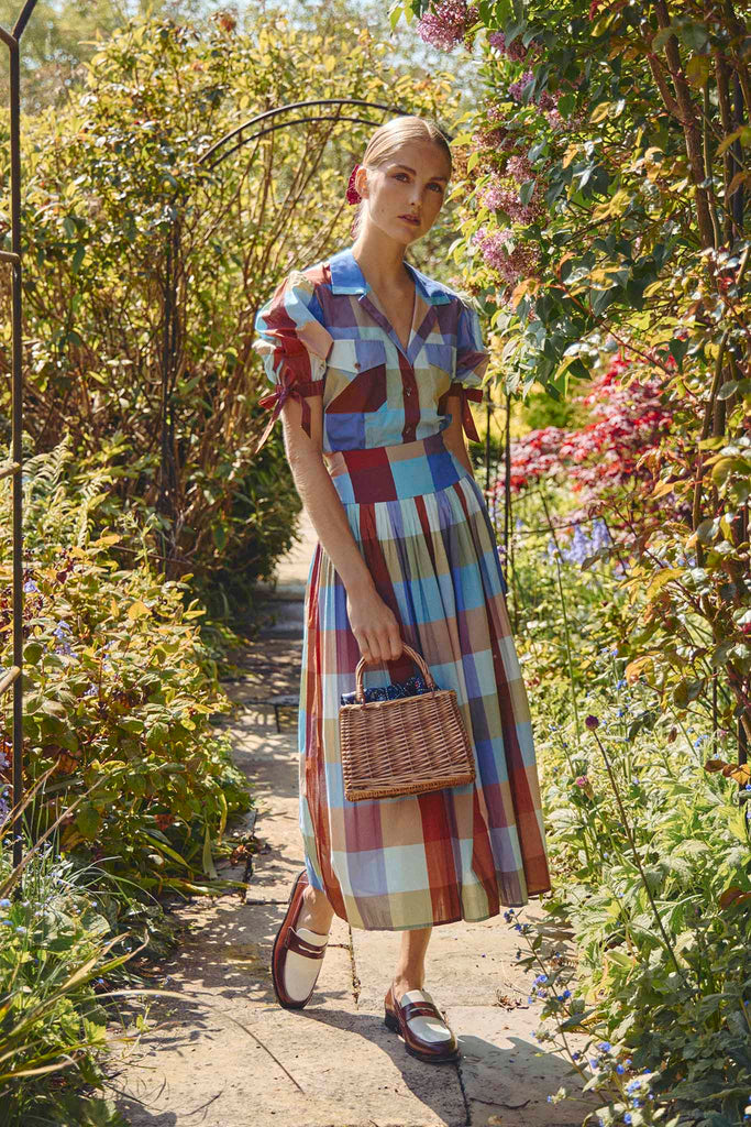 The Stratton Skirt in yarn dyed Tetbury Plaid has a wide waist yoke and a shirred, pleated skirt.