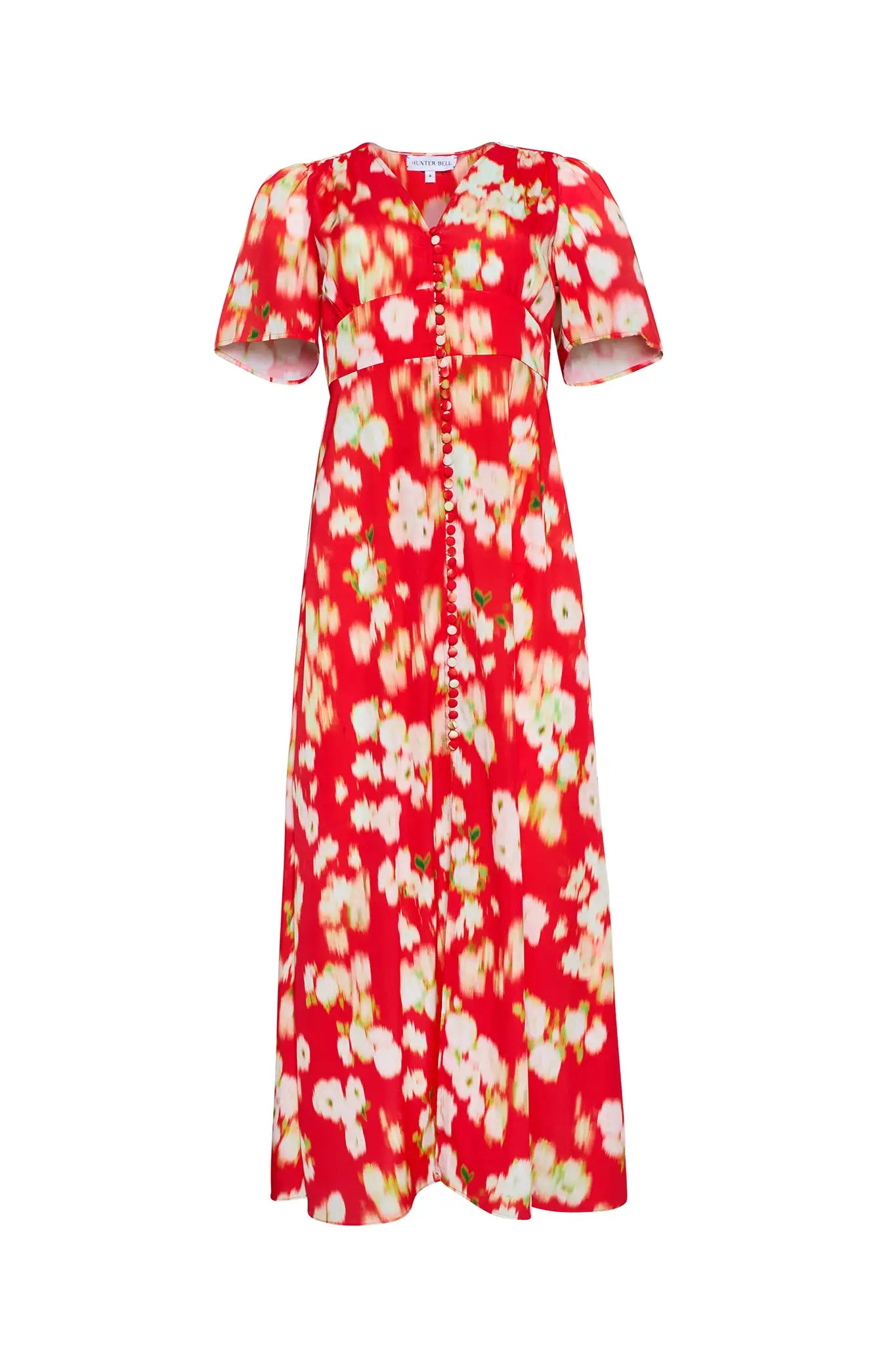 An A-line fitted waist midi dress in an orange and yellow print