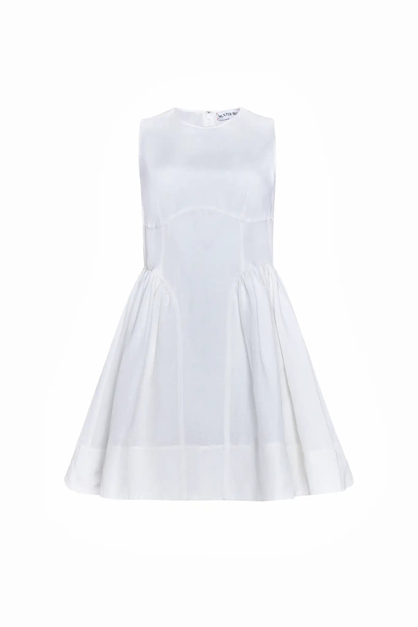 White linen mini dress with structured bustier bodice.