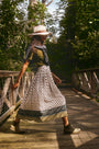 The Dominic Skirt in Thistle & Vine Cream paired with Lee Top in Pine Grove and Lewis Pullover.