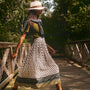 The Dominic Skirt in Thistle & Vine Cream paired with Lee Top in Pine Grove and Lewis Pullover.