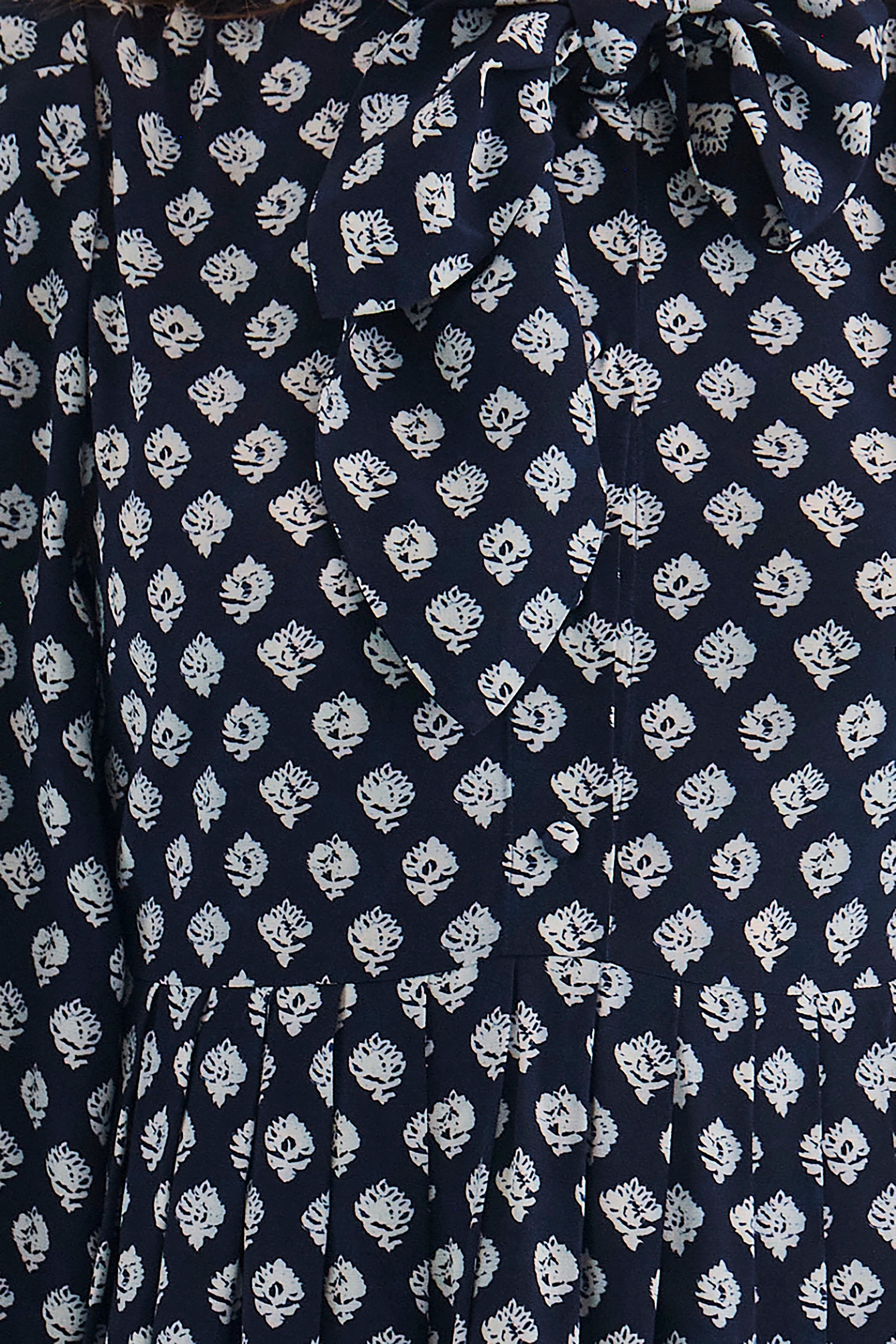 Close up of the Lila Dress in Thistle & Vine Blue. 