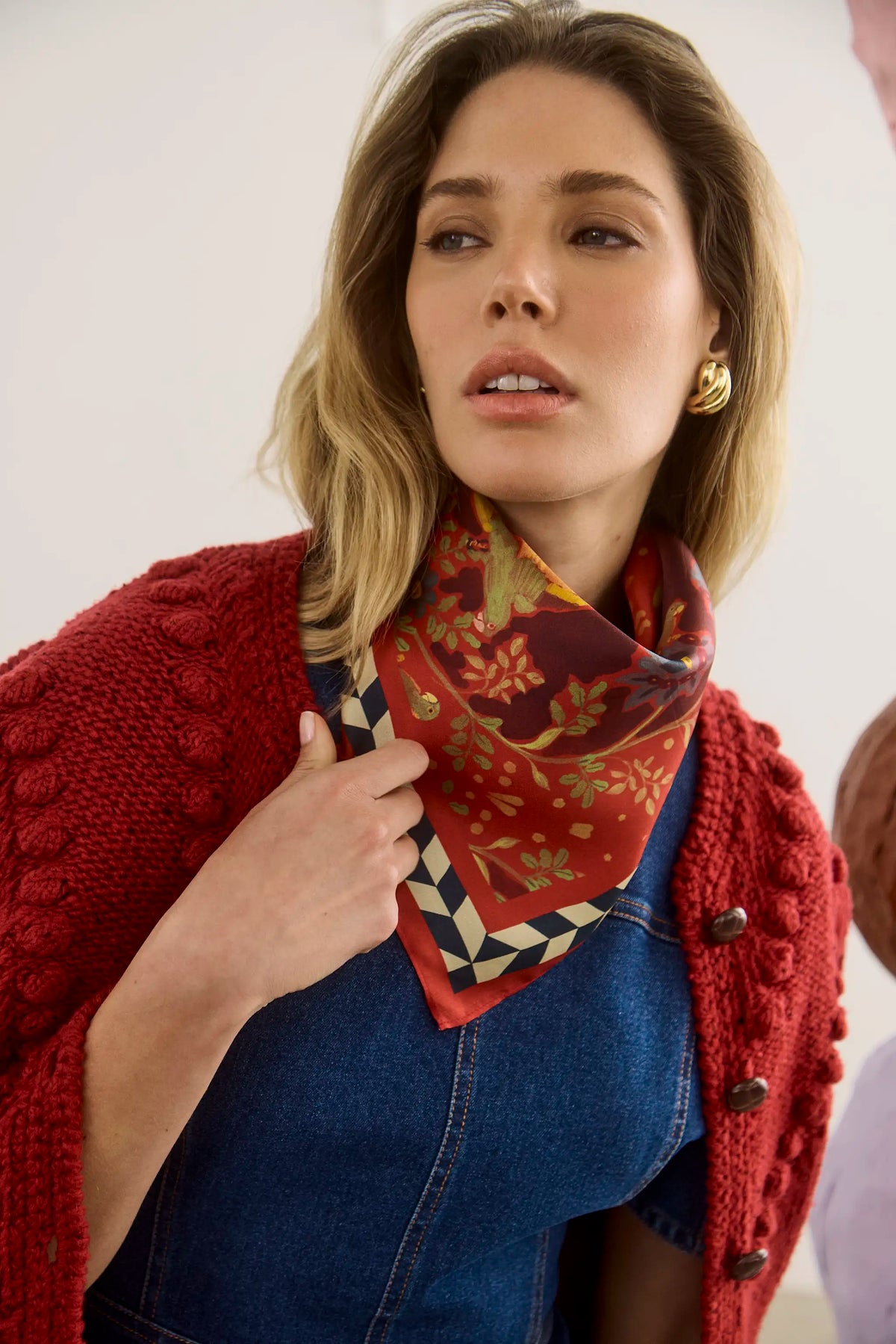The scarf in Birds of a Feather Maroon paired with the Loving Dress and the Bobble Sweater.