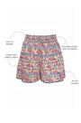 These Lura Shorts have a smocked waist and adjustable tie, made with Liberty Fabric.
