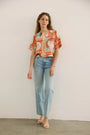 The Maeve Top in lost at sea paired with denim.