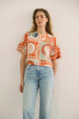 The Maeve Top in lost at sea paired with denim.