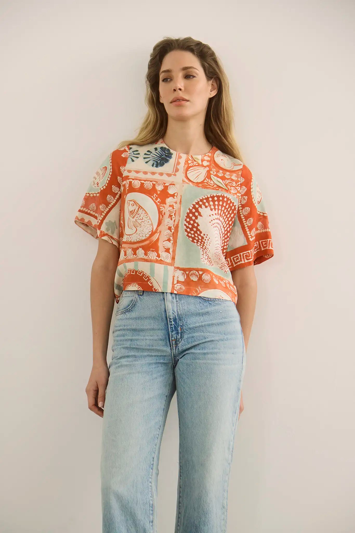 The Maeve Top in lost at sea paired with denim.