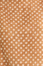 Close up of The Cunningham pant in Coconut Sand Dot.