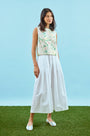 The Manning Top in Garden Rose Peony paired with white whisper pants.