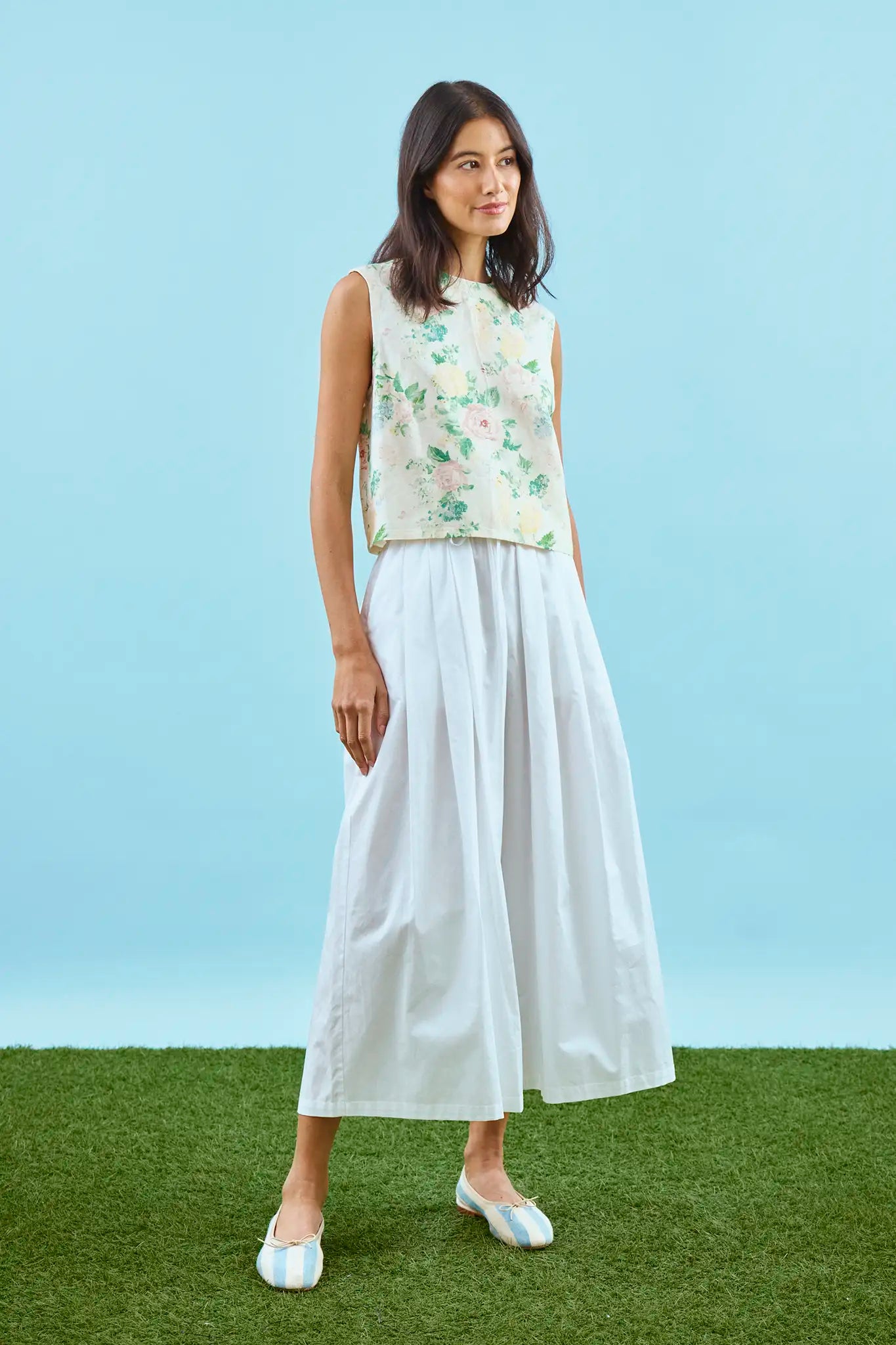 The Manning Top in Garden Rose Peony paired with white whisper pants.