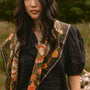 The Mare Top in Onyx paired with the Suki Skirt in Found Heirloom and matching scarf. 