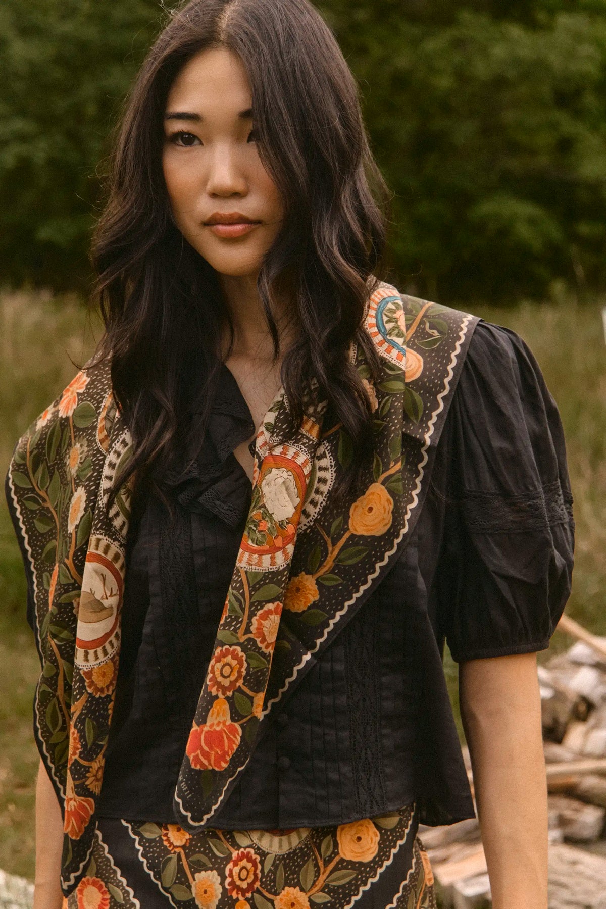 The Mare Top in Onyx paired with the Suki Skirt in Found Heirloom and matching scarf. 